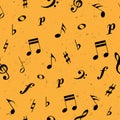 Black music notes and treble, bass clef on yellow background. Seamless pattern. Music class, school. Royalty Free Stock Photo