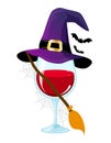 One glass on Wine in witch costume. - red wine with witch hat, broomstick and bats.