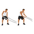 Man doing battle rope side to side swings exercise. Royalty Free Stock Photo