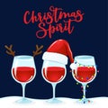 Christmas Spirit - Three wine glass, Wine in Santa hat, Christmas light, reindeer antlers. Royalty Free Stock Photo