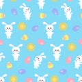 Easter seamless pattern with cute bunnies, sun and colored eggs on blue.