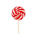 Red and white lollipop swirl on wooden stick isolated on white background. Royalty Free Stock Photo