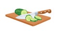 Sliced green cucumber with knife on cutting board. Cooking concept.