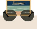 A vibrant summer themed in a pair of stylish sunglasses of reflection in the lenses Royalty Free Stock Photo