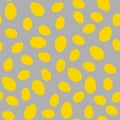 Seamless pattern with yellow eggs. Royalty Free Stock Photo