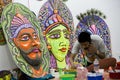 Art institute student preparing a big size colorful mask.