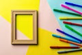 Colored pencils and picture frames. - art and learning concept. Royalty Free Stock Photo