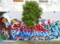 Art letters and a female portrait Graffiti on the wall in Bondi suburb, Sydney