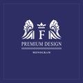 Art logo design. Capital letter F. Elegant emblem with crown, dragon wings. Beautiful creative monogram. Graceful sign for Royalty Royalty Free Stock Photo