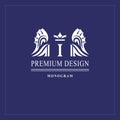 Art logo design. Capital letter I. Elegant emblem with crown, dragon wings. Beautiful creative monogram. Graceful sign for Royalty Royalty Free Stock Photo