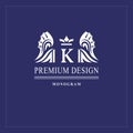 Art logo design. Capital letter K. Elegant emblem with crown, dragon wings. Beautiful creative monogram. Graceful sign for Royalty Royalty Free Stock Photo