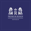 Art logo design. Capital letter R. Elegant emblem with crown, dragon wings. Beautiful creative monogram. Graceful sign for Royalty Royalty Free Stock Photo