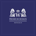 Art logo design. Capital letter W. Elegant emblem with crown, dragon wings. Beautiful creative monogram. Graceful sign for Royalty Royalty Free Stock Photo