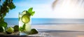 majito tropical longdrink cocktail on the background of the beach, sea or ocean. Vacation summer concept. Ai generative Royalty Free Stock Photo