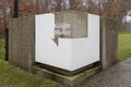 Art museum entrance stone with the name and logo of the Hoge Veluwe park venue