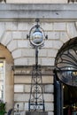 Decorative lamp with the text `Market` outside Bath Guildhall Market