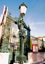 Art Nouveau street lamp and section of an iron fence, Vila Sauda, Lisbon, Portugal