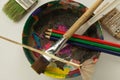 Art paint brushes wooden paint mixing bowl multiple colors coloring pencil