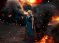 Art photo. Fantasy woman queen, blonde hair in braids. Warrior princess girl stands on background of black smoke