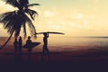 Art photo styles of silhouette surfer on beach at sunset