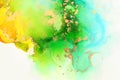 art photography of abstract fluid art painting with alcohol ink, ocean colors, green, turquoise, blue and gold