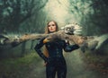 art portrait real people fantasy woman assassin holding white-tailed eagle bird flaping open wings flies on hand. Elf Royalty Free Stock Photo