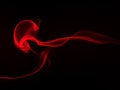 Art of red smoke abstract on black background, fire design, darkness concept Royalty Free Stock Photo