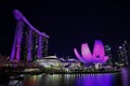 Art Science Museum, Helix Bridge and Marina Bay Sands are red in the nightwith a lilac light Royalty Free Stock Photo
