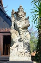 Art sculpture and carved antique guardian hindu statue balinese style in Baandam Museum or antique wooden Black House Baan Dam