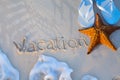 Art starfish and flip flops on a tropical beach Royalty Free Stock Photo