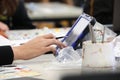 Art student using a digital device like a tablet during an art painting lesson. Royalty Free Stock Photo