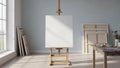 Studio features a wooden easel with a blank canvas centered in the Royalty Free Stock Photo