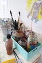 Art supplies, used palette and brushes, for painting. Art club or lessons concept