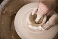 Women`s hands and potter`s wheel Royalty Free Stock Photo