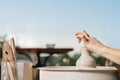 Art therapy. Women`s hands make a pot of clay on a potter`s wheel. Workshop on pottery Royalty Free Stock Photo