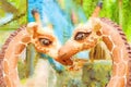 Watercolor of giraffe statue in garden