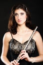 Art. Woman flutist flaustist musician with flute Royalty Free Stock Photo