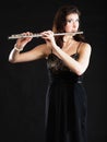 Art. Woman flutist flaustist musician playing flute Royalty Free Stock Photo