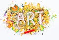 Art word on the background of bright colored pencil shavings Royalty Free Stock Photo