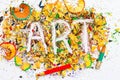 Art word on the background of colored pencil shavings Royalty Free Stock Photo