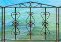 Art work old iron, gate, frame, decorative wrought fence retro decor architecture, element, ornament Royalty Free Stock Photo