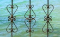 Art work old iron, gate, frame, decorative wrought fence retro decor architecture, element, ornament Royalty Free Stock Photo