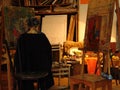 art workshop. artist paints a still life on a tablet. creative atmosphere. Royalty Free Stock Photo