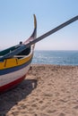 Arte Xavega typical portuguese old fishing boat on the beach in Paramos Espinho Portugal Royalty Free Stock Photo