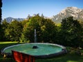 Artesian fountain with fish ponds in the garden