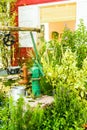 Artesian well and bucket. Royalty Free Stock Photo