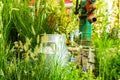 Artesian well and bucket. Royalty Free Stock Photo