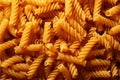 Artful arrangement of pasta spaghetti screws, viewed from the top