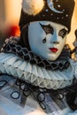 Artful mask in wonderful costume at the famous carnival in Venice