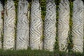 Artful wall made of congrete columns outside Royalty Free Stock Photo